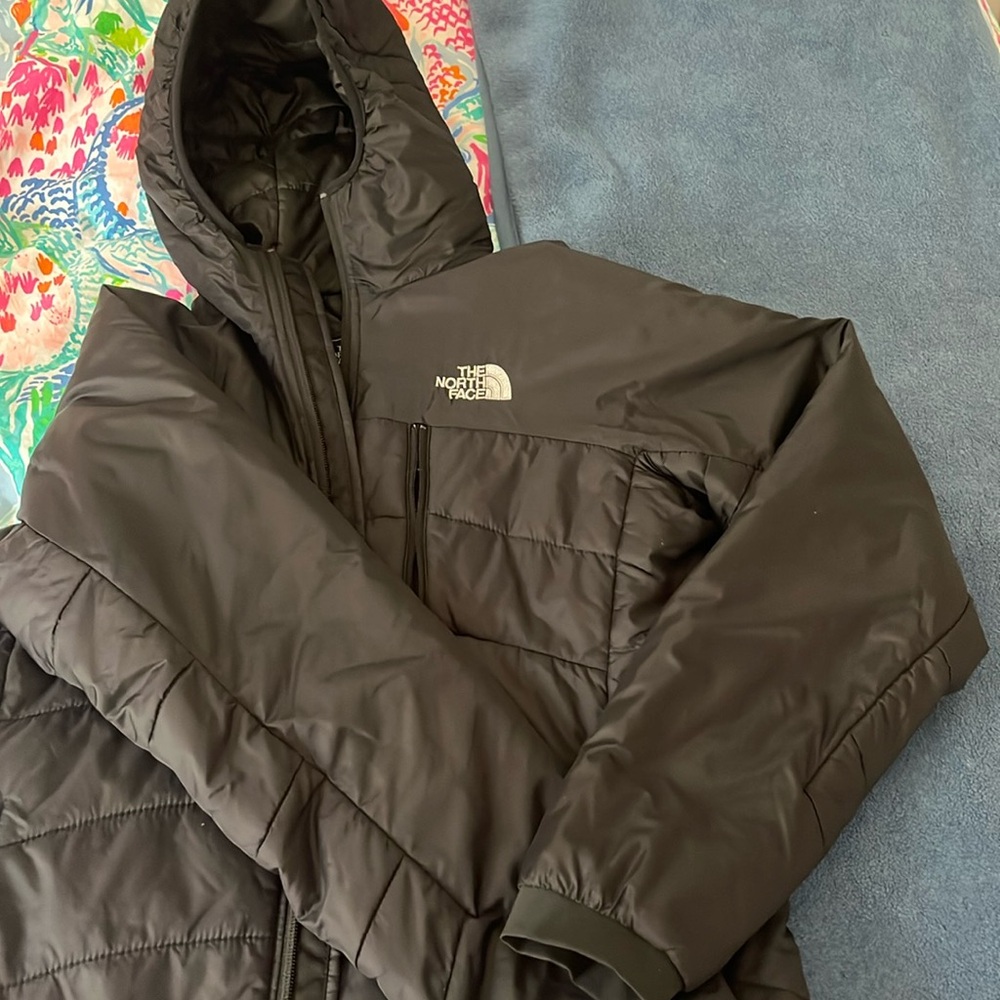 Black with small red accents.  Part of time less collection- summit series’s S.